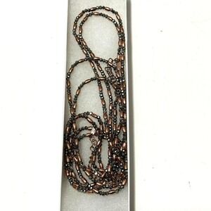 Set of two YCLM brand chrome silver and bronze long necklaces